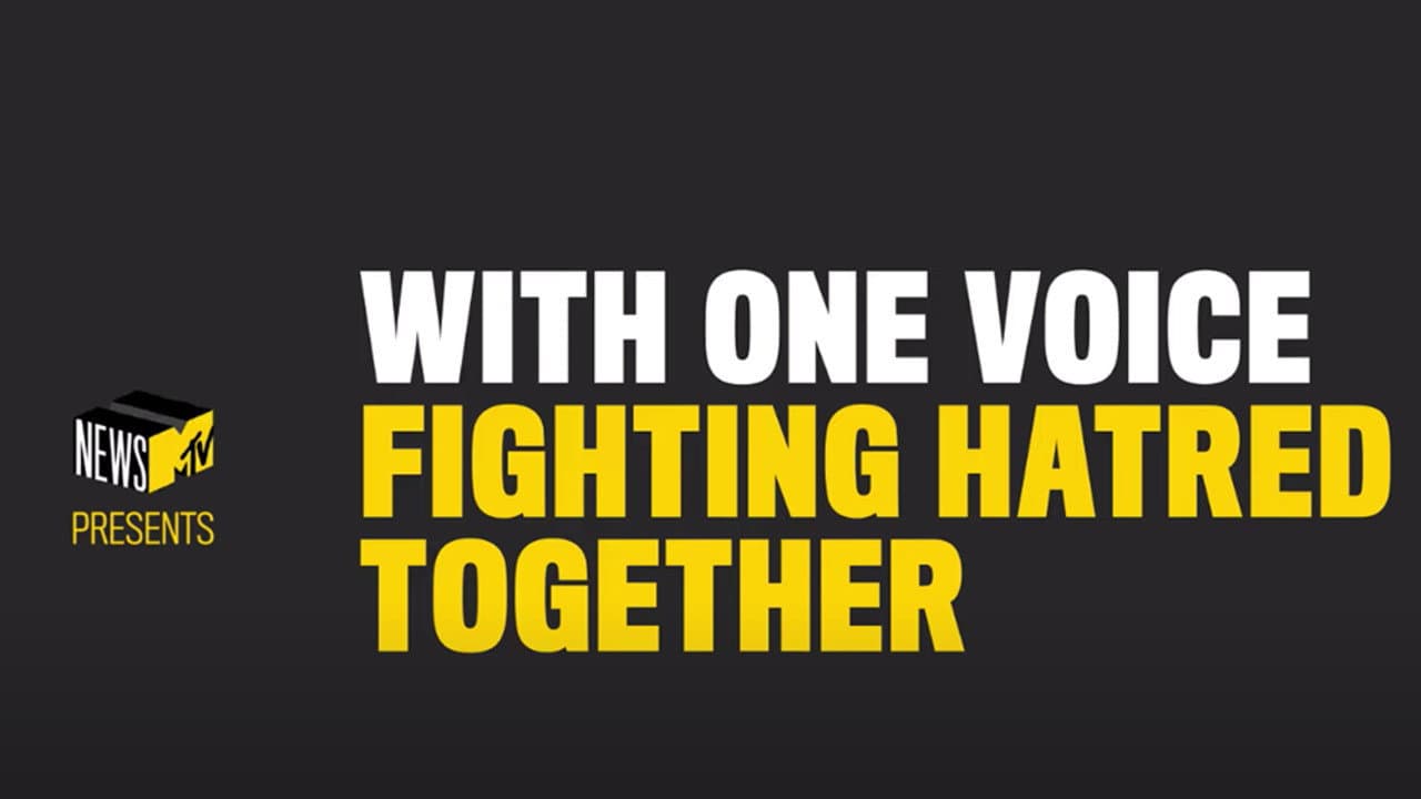 With One Voice Fighting Hatred Together backdrop