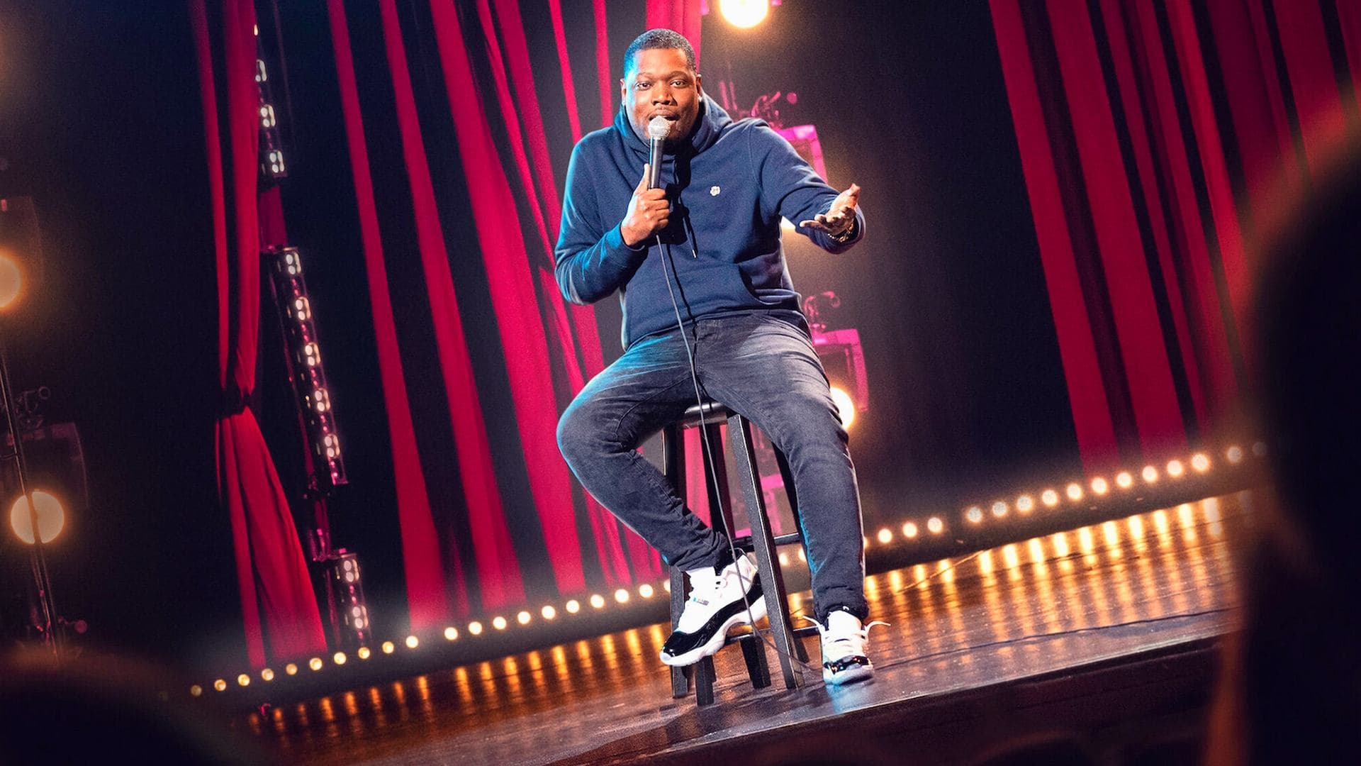 Michael Che: Shame the Devil backdrop