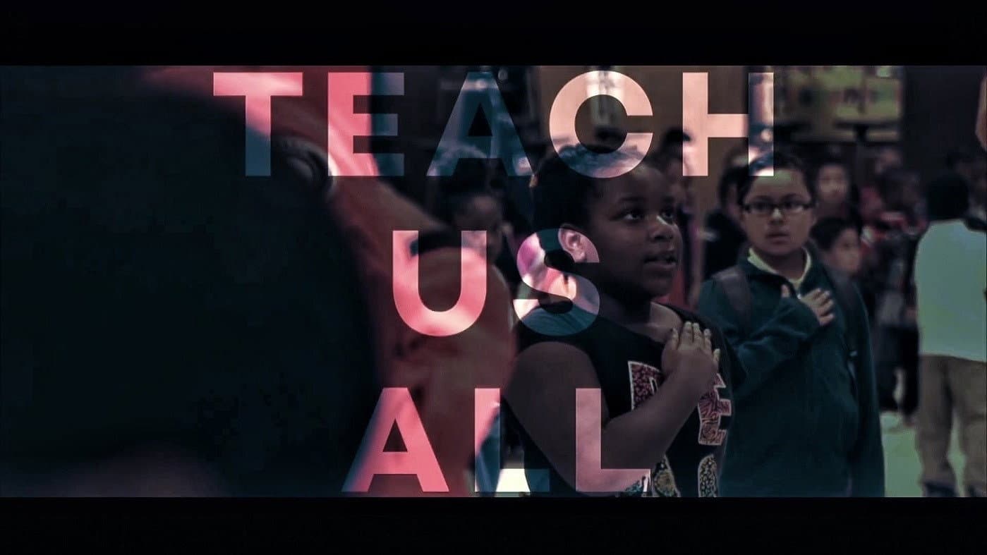 Teach Us All backdrop