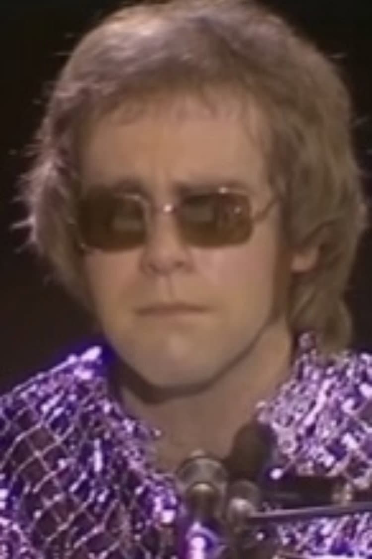 Elton John at the Royal Festival Hall, London with The Royal Philharmonic Orchestra backdrop