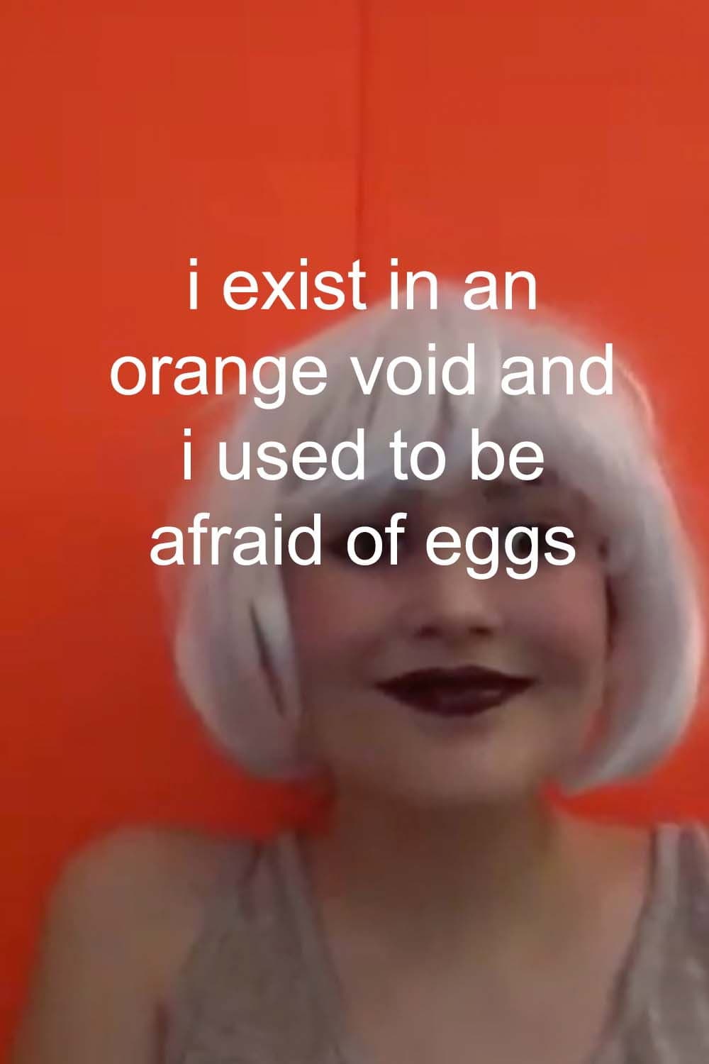 i exist in an orange void and i used to be afraid of eggs backdrop