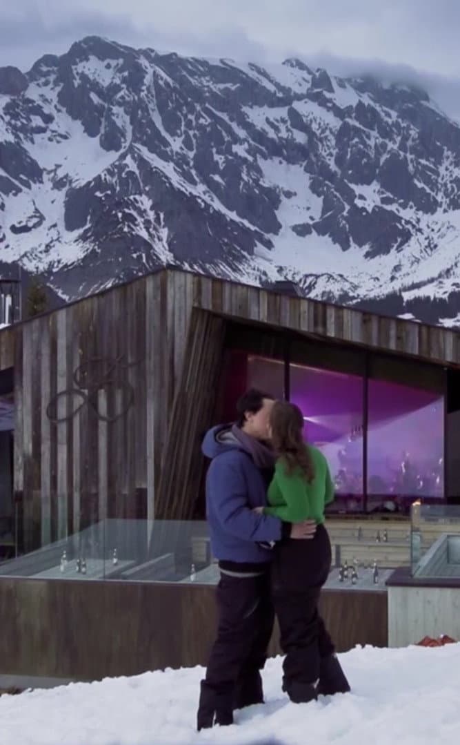 Guy Proposes To His Girlfriend On A Mountain backdrop
