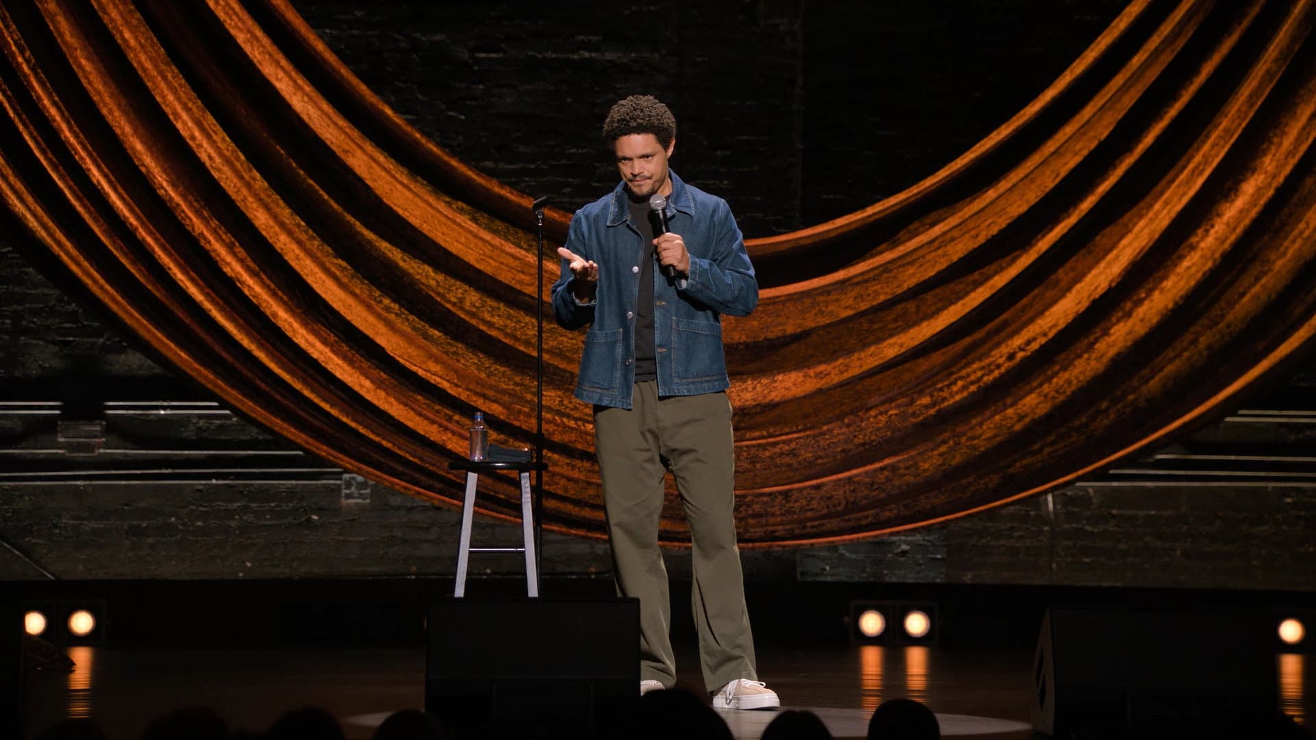 Trevor Noah: Joy in the Trenches backdrop