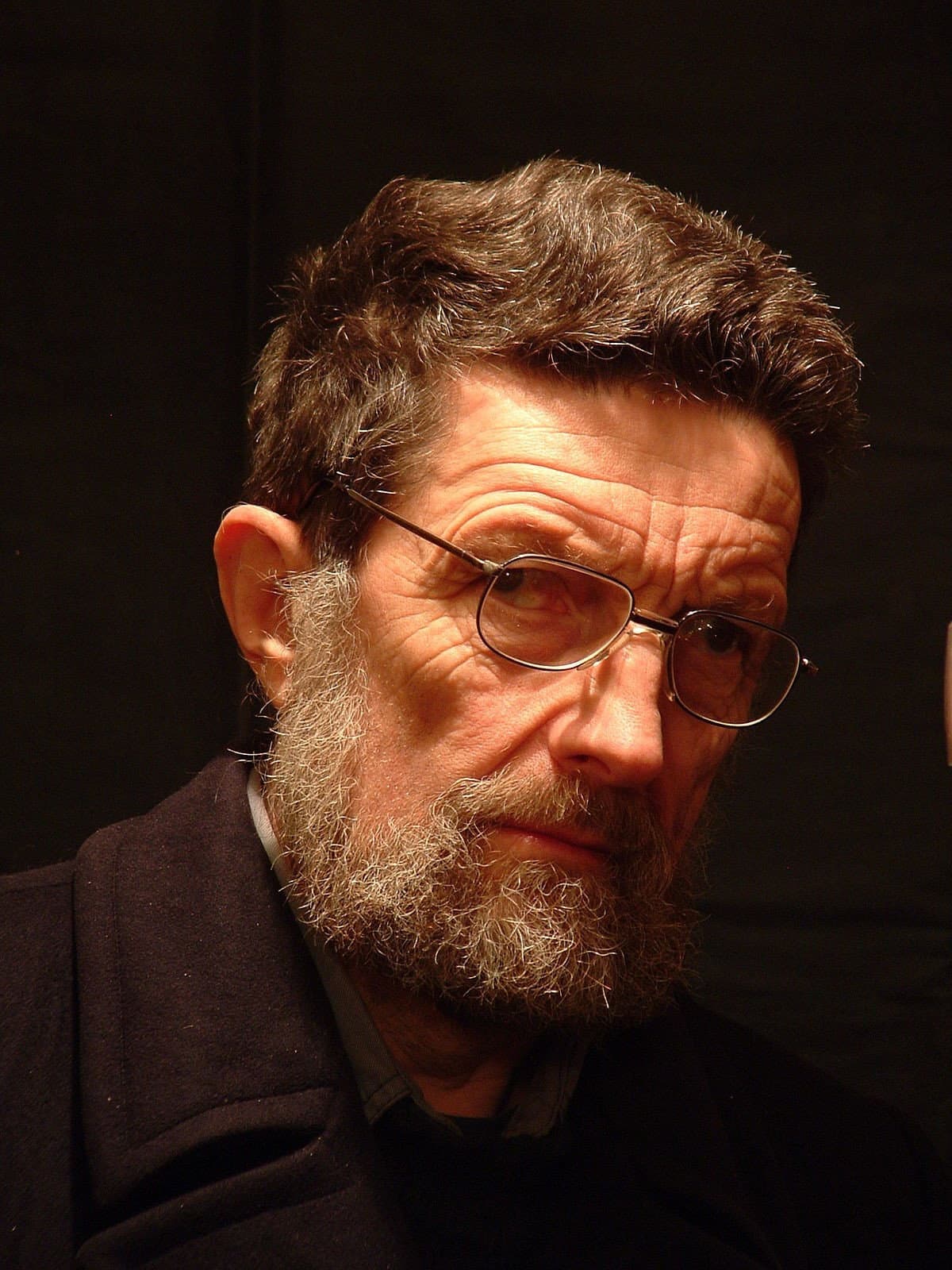The Man Behind the Masquerade backdrop